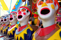 Laughing clowns game at a carnival
