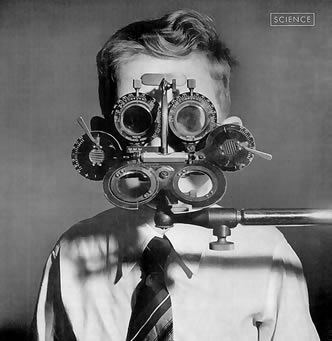 1940's boy with eye testing equipment