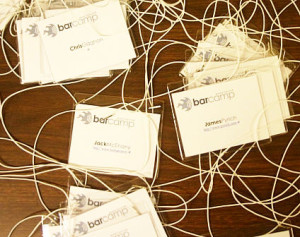 A jumble of conference tags (or labels)