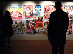Patrons reviewing artworks at a gallery