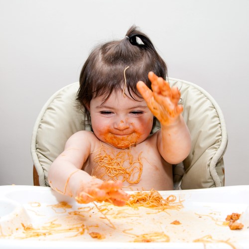 Happy funny messy eater