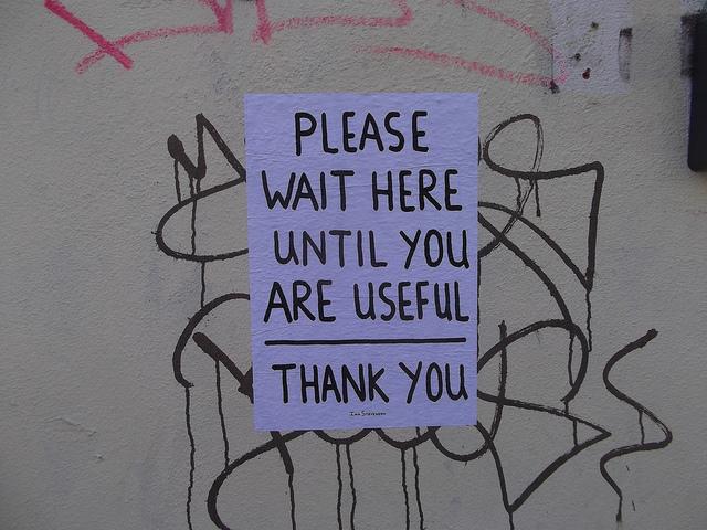 Urban artwork: Wait Here Until You Are Useful