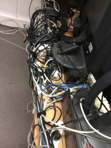Messy cabling at the back of Adam's desk